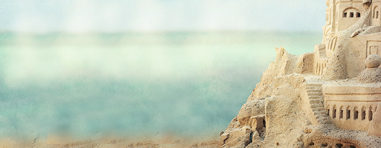 A sandcastle on the beach.