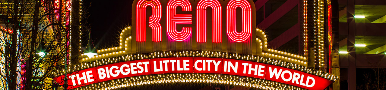 A billboard reads, "Reno, the biggest little city in the world."