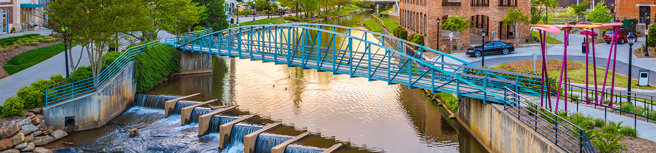 A pedestrian bridge connecting two sides of Laurel Creek.