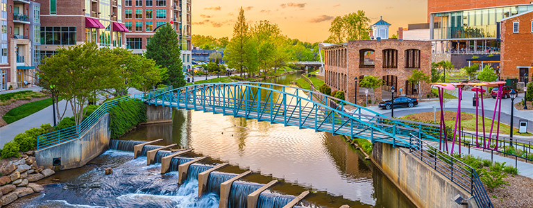 A pedestrian bridge connecting two sides of Laurel Creek.