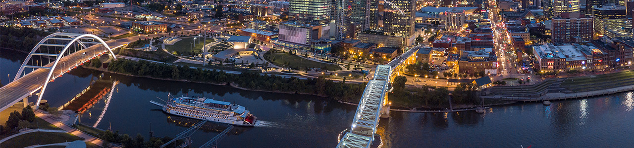 A nighttime landscape of downtown Nashville.