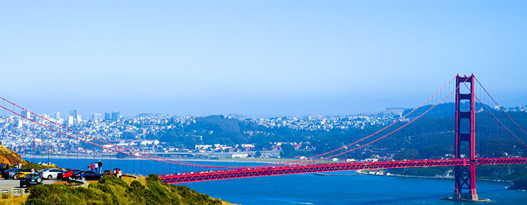 The Golden Gate stands in front of downtown San Francisco.