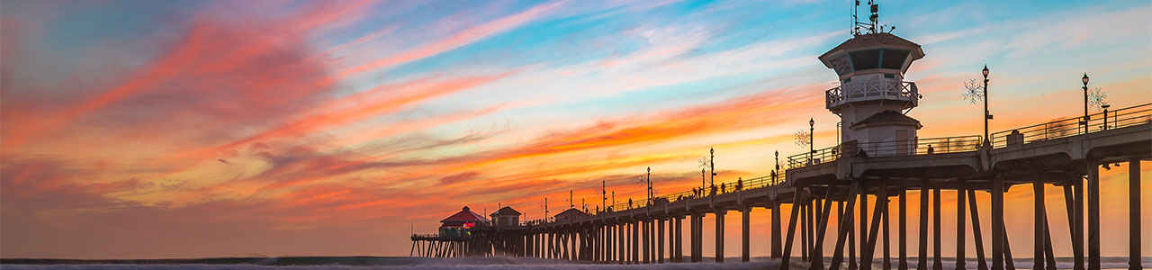 A view of a pier on the California coast.